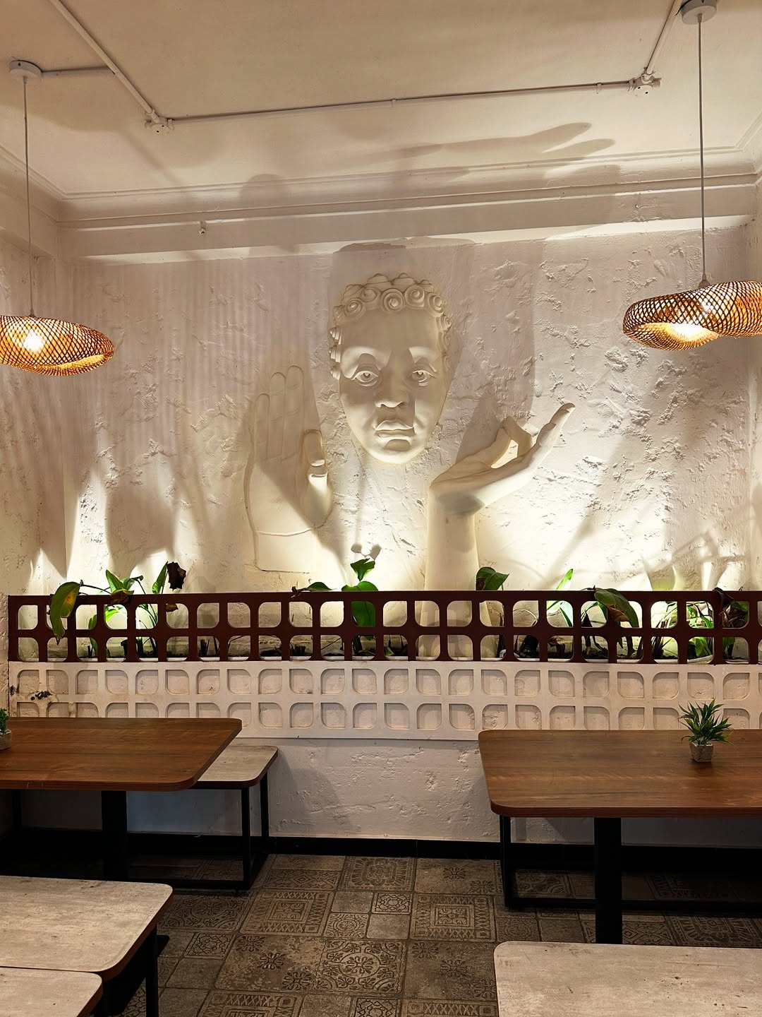 Warm Buddha-themed dining ambience at The Midtown Bistro